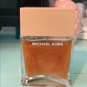 Michael Kors Shimmering fragrance spray.